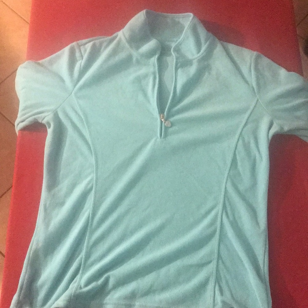 A medium sized teal work out jacket